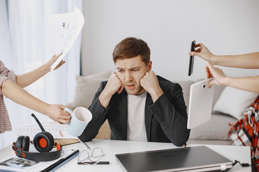 man-sitting-living-room-home-sad-man-tired-from-work_1157-48731